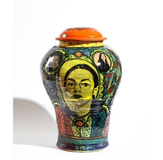 Brightly colored vase by artist Roberto Lugo featuring a portraits of Representative Alexandria Ocasio-Cortez, Stacey Abrams, and Vice President Kamala Harris.