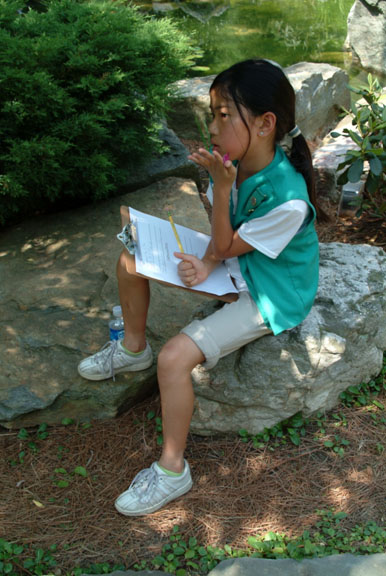 Junior Girl Scout in Hillwood's gardens