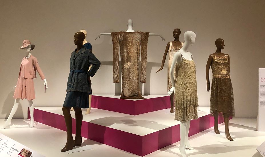 Image of mannequins displaying various fashions as part of an exhibition.