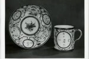 SAUCER WITH REBUS (SOUCOUPE), ONE OF TWO