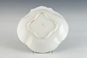 SHELL-SHAPED DISH FROM A DINNER SERVICE