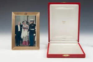 FRAME WITH PHOTOGRAPH OF MARJORIE MERRIWEATHER POST AT A RED CROSS BALL