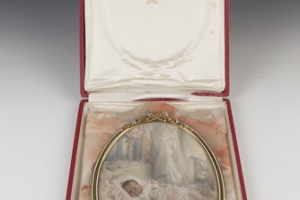 FRAME WITH MINIATURE OF NEDENIA HUTTON AS A BABY