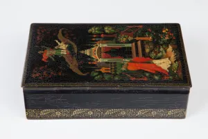 BOX WITH A SCENE OF A MAN AND WOMAN ON A FLYING CARPET