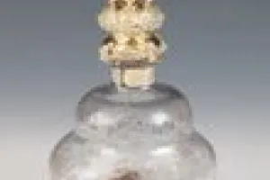 LARGE GLASS BOTTLE WITH STOPPER FROM A DRESSING TABLE SET (ONE OF TWO)