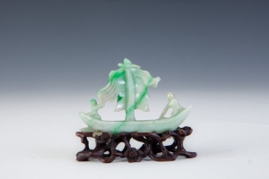 FIGURINE OF A RIVERBOAT