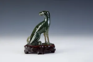 FIGURINE OF A DOG (ONE OF TWO)