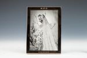 FRAME WITH WEDDING PHOTOGRAPH OF DINA MERRILL