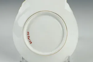 SHELL-SHAPED DISH FROM A DINNER SERVICE