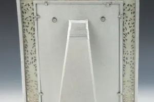 FRAME WITH PHOTOGRAPH OF ELEANOR POST CLOSE WITH A DOG