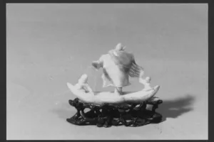 FIGURINE OF A RIVERBOAT