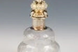 SMALL GLASS BOTTLE WITH STOPPER FROM A DRESSING TABLE SET (ONE OF TWO)