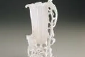 VASE IN THE FORM OF TRUMPET FLOWERS
