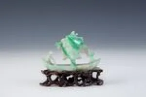 FIGURINE OF A RIVERBOAT