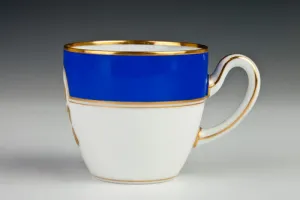 CUP FROM A DINNER SERVICE, ONE OF NINE