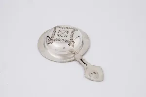 TEA STRAINER FROM A TEA AND COFFEE SERVICE