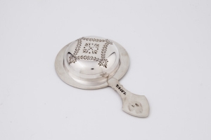 TEA STRAINER FROM A TEA AND COFFEE SERVICE