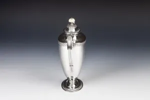 COFFEEPOT FROM A COFFEE SERVICE