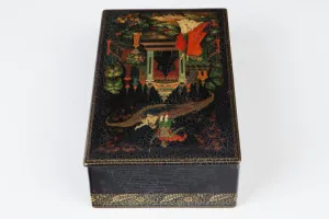 BOX WITH A SCENE OF A MAN AND WOMAN ON A FLYING CARPET