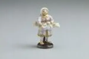 PEASANT WOMAN CARRYING A BUNDLE