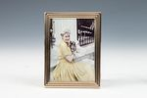 FRAME WITH PHOTOGRAPH OF MARJORIE MERRIWEATHER POST AND SCAMPI