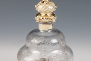 LARGE GLASS BOTTLE WITH STOPPER FROM A DRESSING TABLE SET (ONE OF TWO)