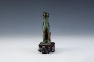 FIGURINE OF A DOG (ONE OF TWO)