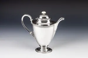 COFFEEPOT FROM A COFFEE SERVICE