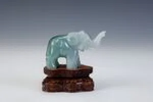 FIGURINE OF AN ELEPHANT (ONE OF TWO)