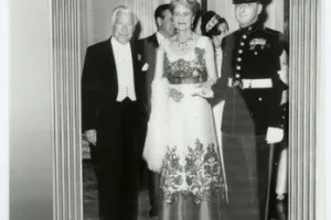 FRAME WITH PHOTOGRAPH OF MARJORIE MERRIWEATHER POST AT A RED CROSS BALL