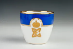 CUP FROM A DINNER SERVICE, ONE OF NINE