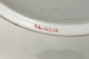 PLATE FROM A DINNER SERVICE, ONE OF 14