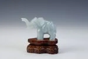 FIGURINE OF AN ELEPHANT (ONE OF TWO)