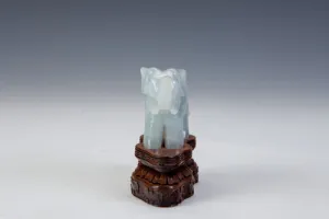 FIGURINE OF AN ELEPHANT (ONE OF TWO)