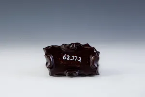 FIGURINE OF A DOG (ONE OF TWO)