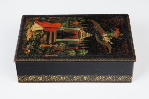 BOX WITH A SCENE OF A MAN AND WOMAN ON A FLYING CARPET