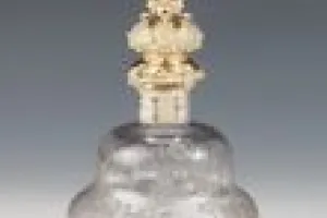 LARGE GLASS BOTTLE WITH STOPPER FROM A DRESSING TABLE SET (ONE OF TWO)