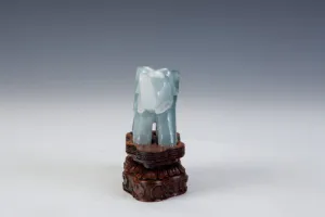 FIGURINE OF AN ELEPHANT (ONE OF TWO)