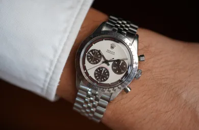 Close-up image of a Rolex wristwatch being worn on someone's wrist.