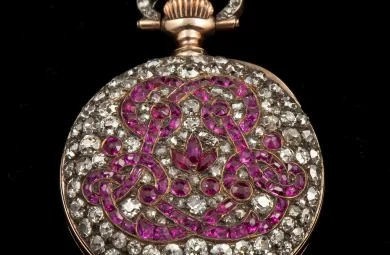 Decorative pocket watch covered in diamonds