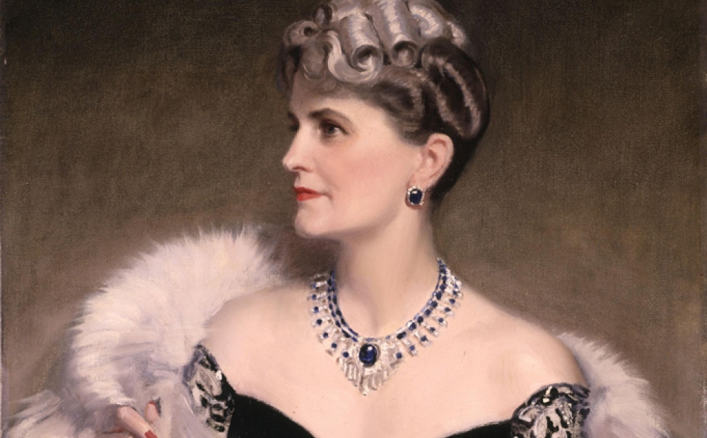 Marjorie Post wearing a beautiful Cartier sapphire, diamond, and platinum necklace.
