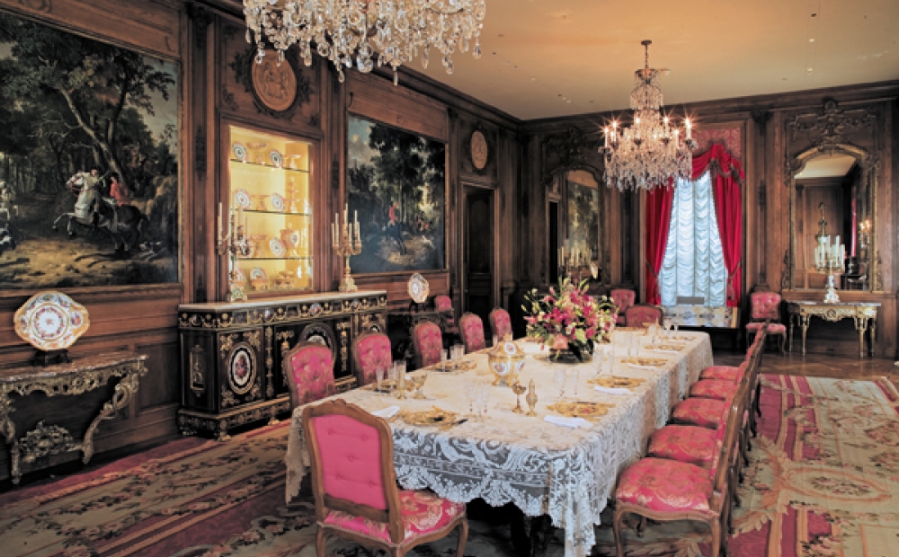 The Dining Room table is set with Marjorie Merriweather Post's services