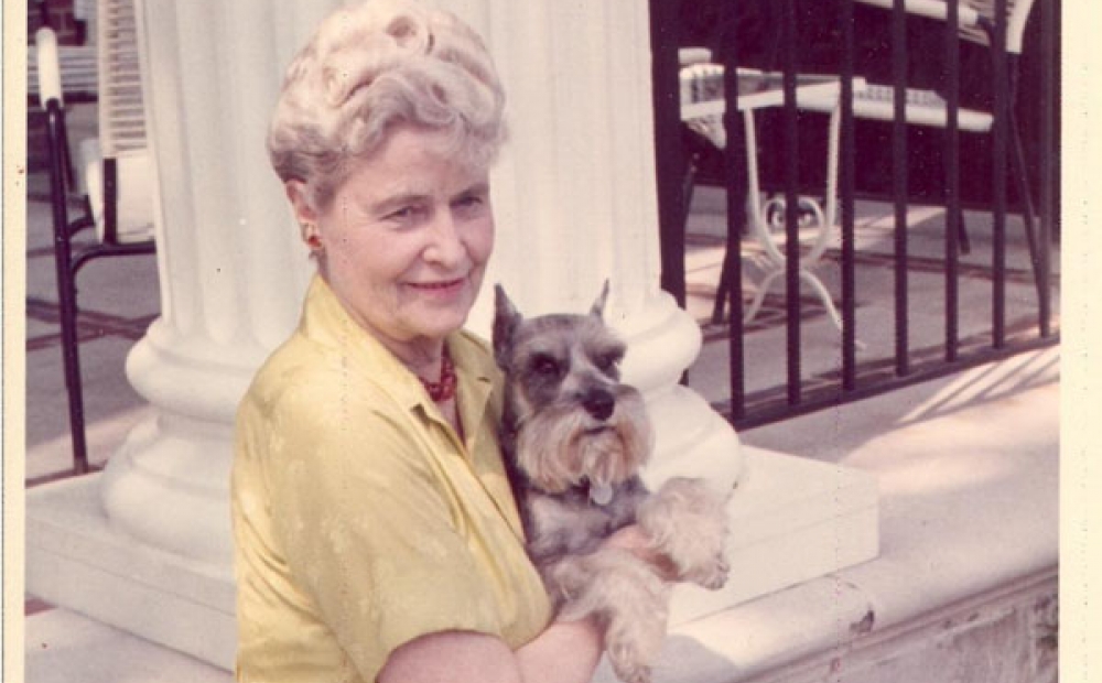 Marjorie Merriweather Post with dog Scampi 1961