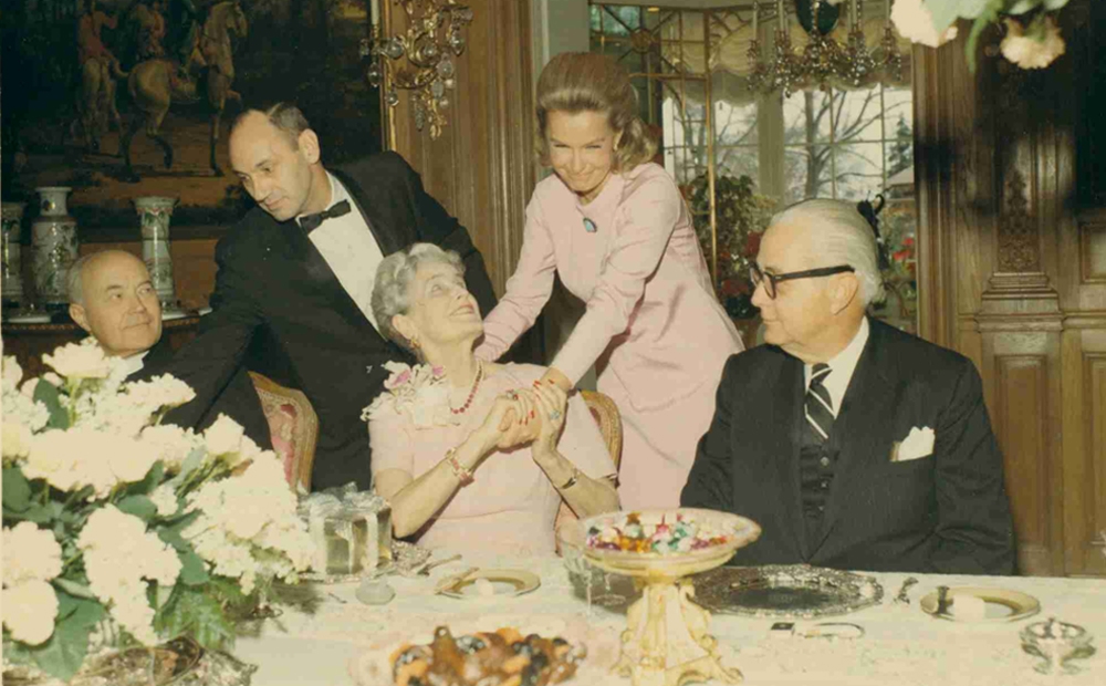 Dina Merrill and Marjorie Post in the dining room