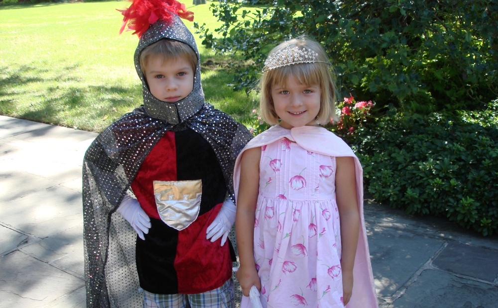 children wearing knight and princess costumes