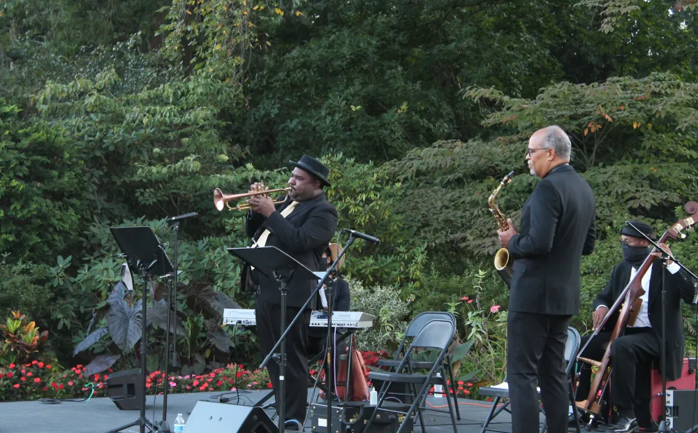 A trumpet player on stage at Jazz in the Gardens at Hillwood.