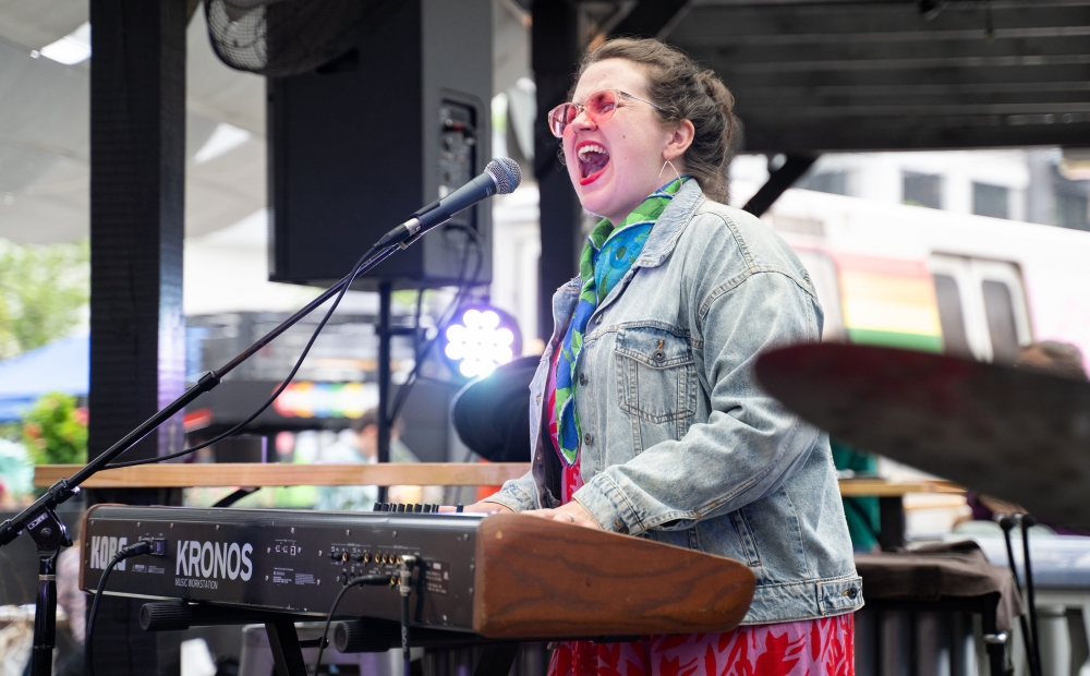 Amy K Bormet playing the piano.