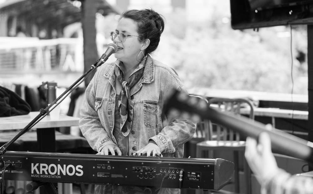 Amy K Bormet playing the piano.