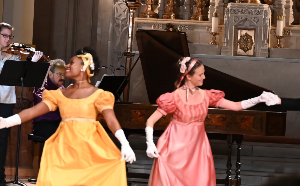Image of dancers and musicians, in performance. 
