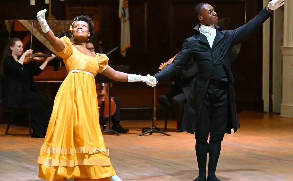 Image of dancers posing for bows at the end of the performance. 